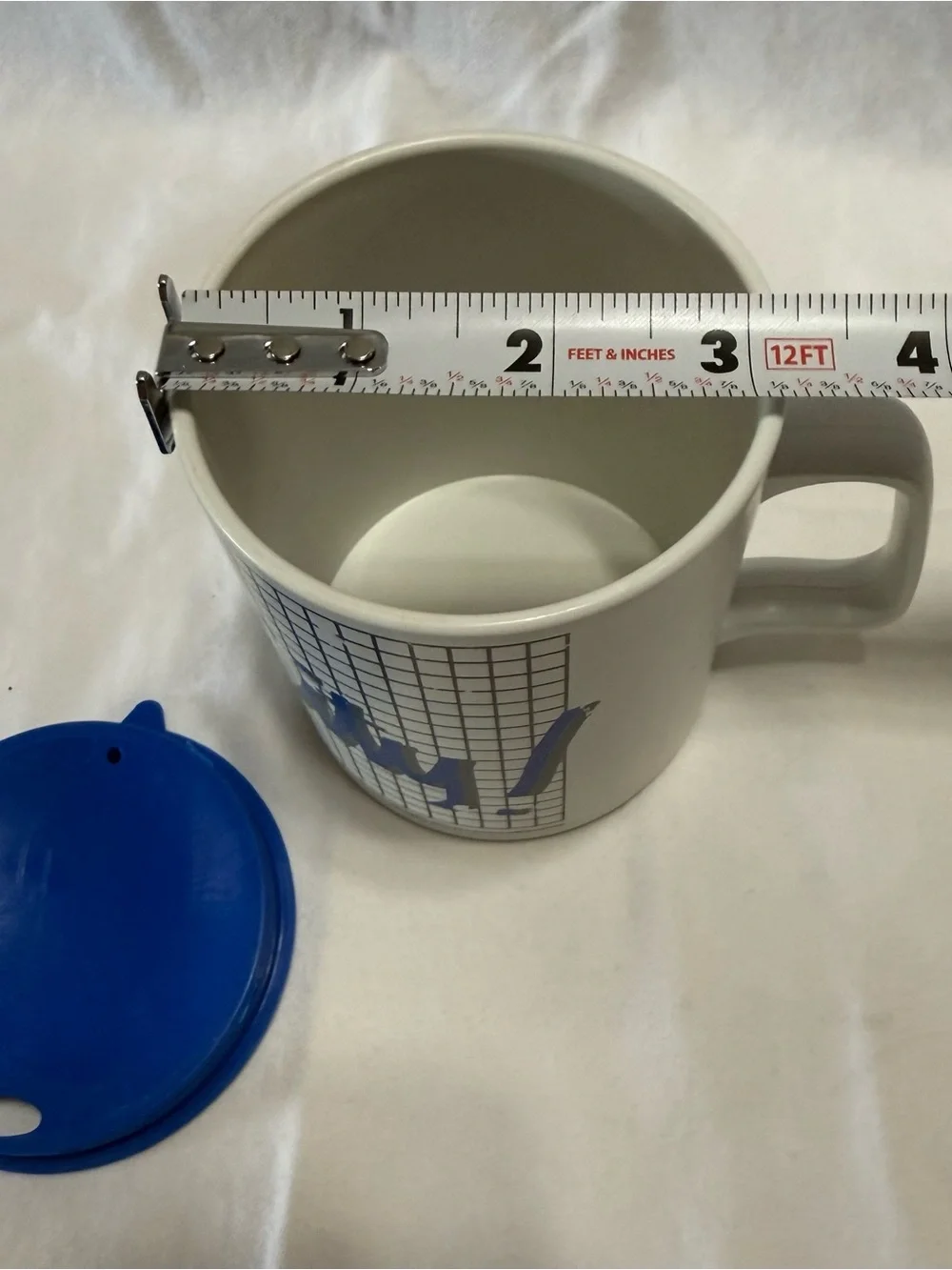 White Plastic Travel Mug with Blue Lid and Blue Kansas City Graphic